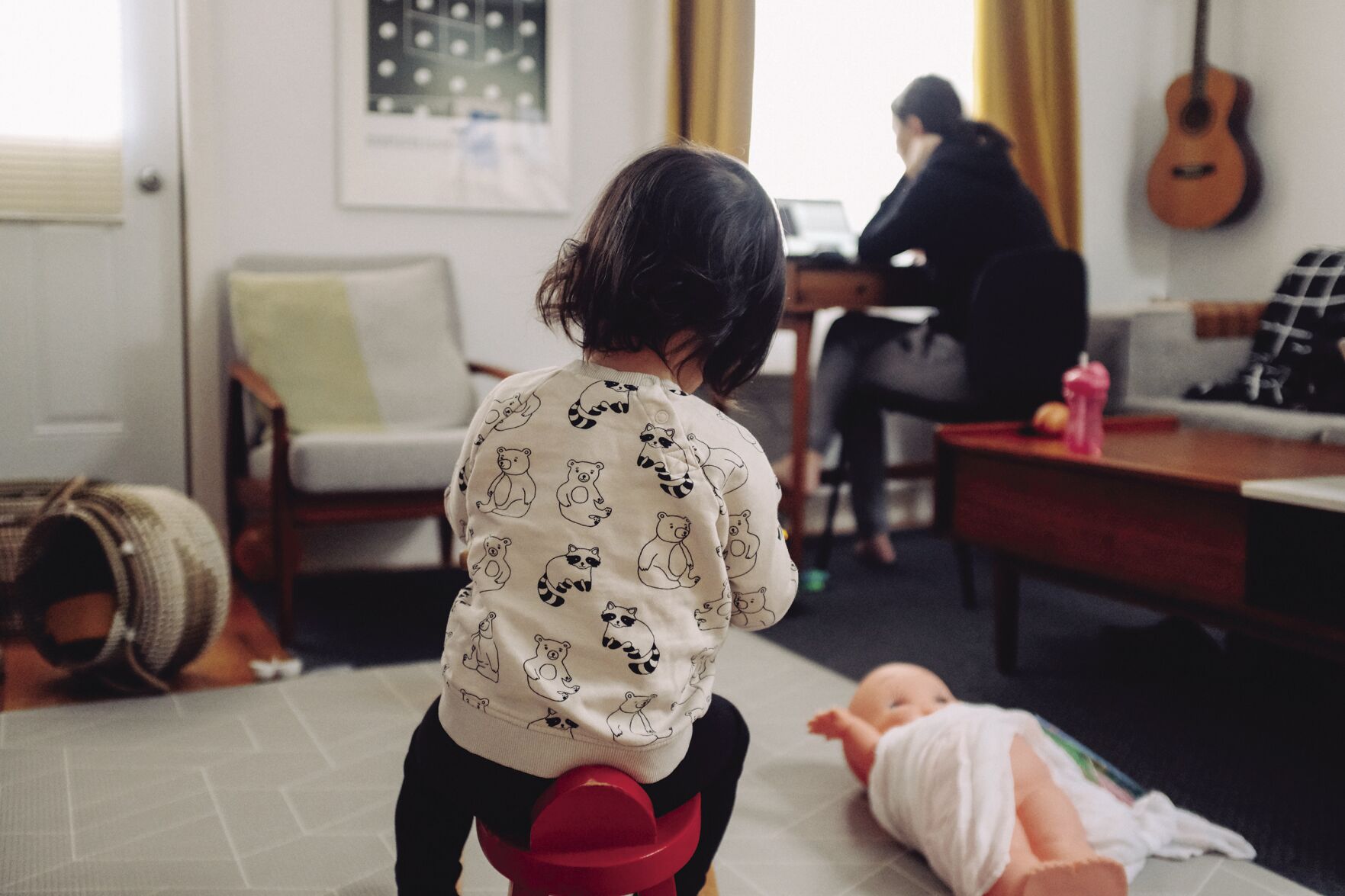 Child with Mom working